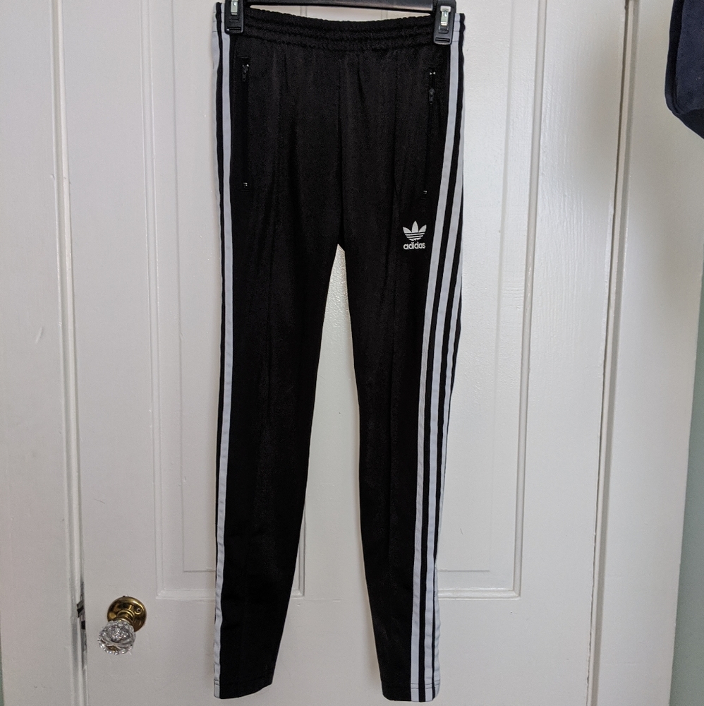 Black Adidas track pants